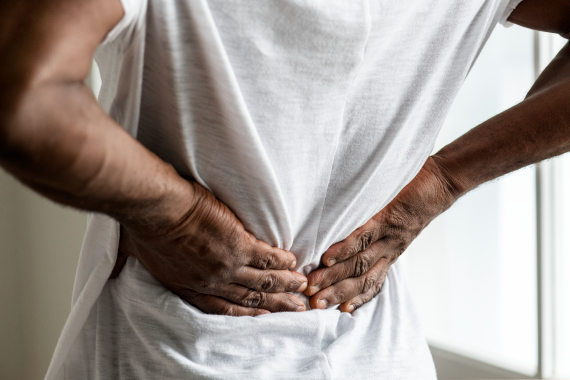 black-man-suffering-back-pain-2022-09-16-09-19-55-utc black-man-suffering-back-pain-2022-09-16-09-19-55-utc
